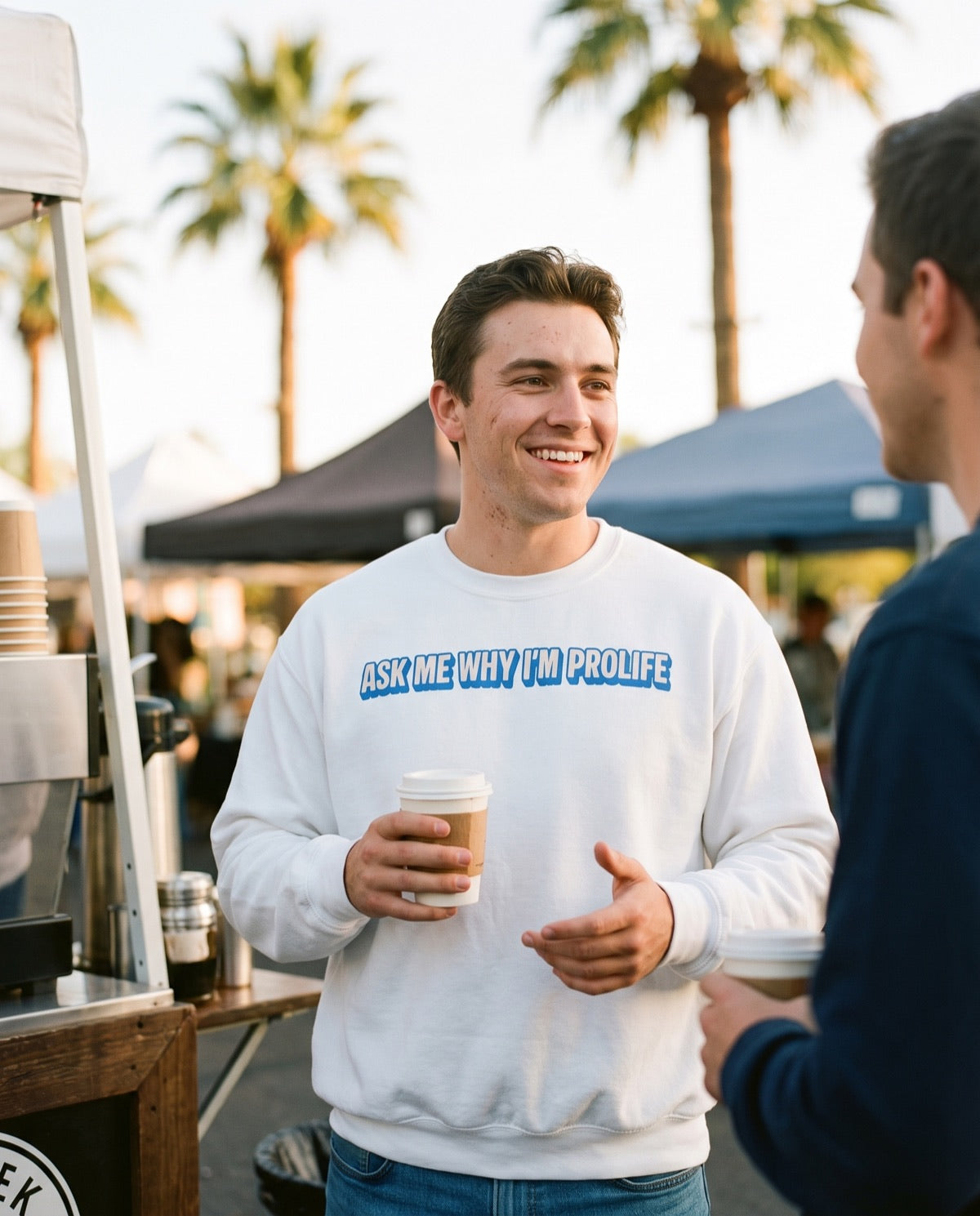 Ask Me Why crewneck at the farmers market